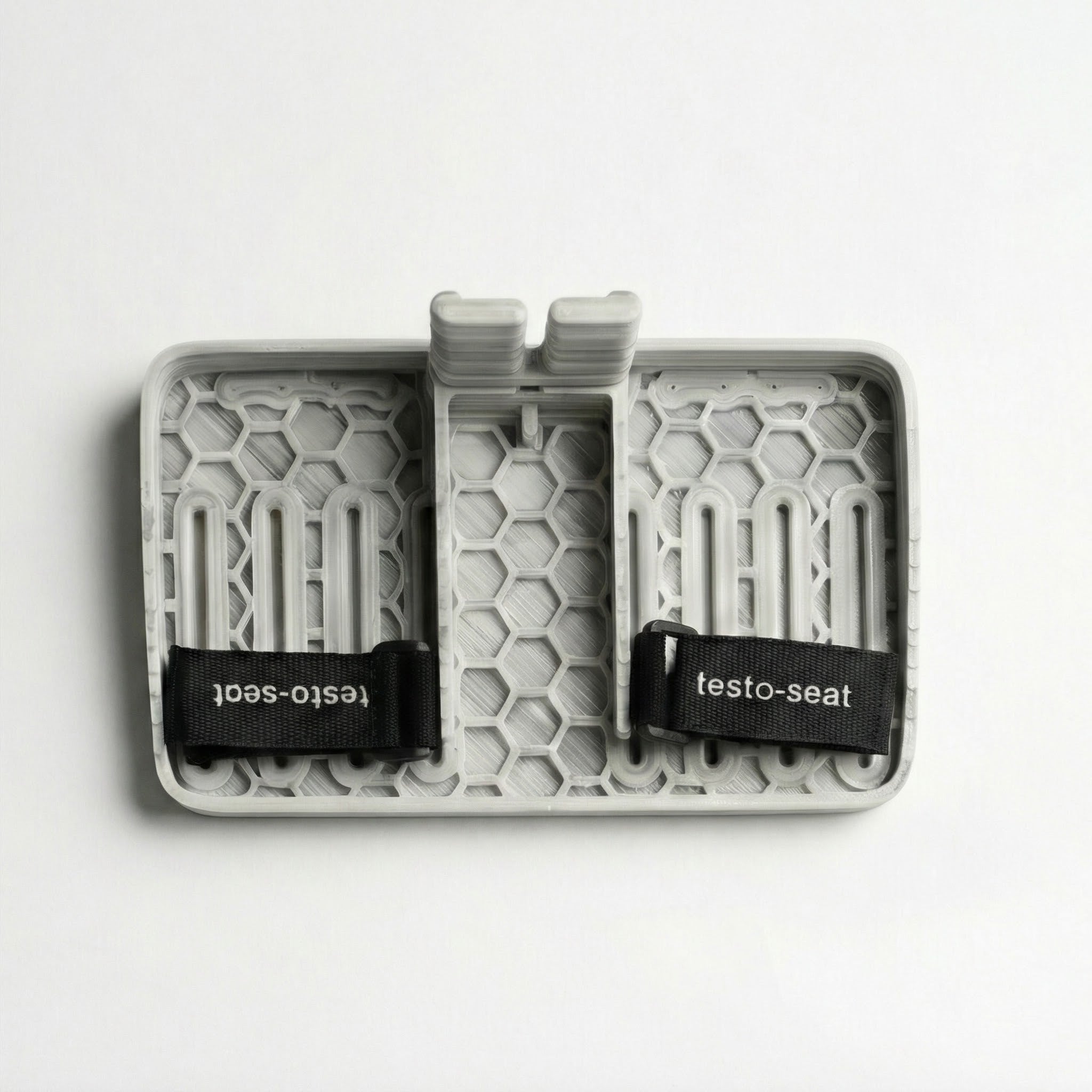 Gray Testa Seat Floor Base & Footrest with honeycomb pattern on a white background